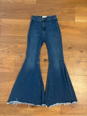 Free People Dark Blue High-Rise Flare Jeans with Raw Hem